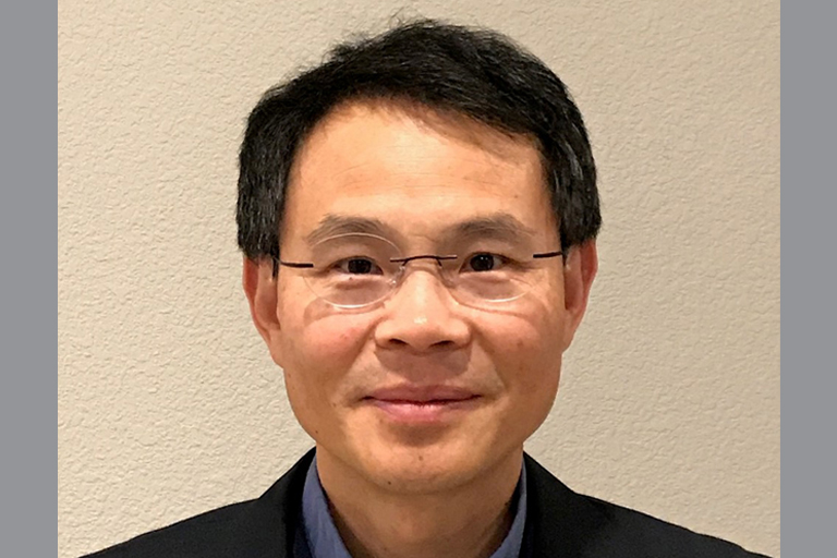 Headshot of Hanping Guan