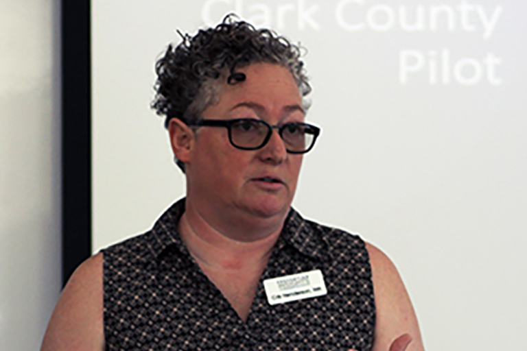 Cris Henderson speaking at the Smartphones and Saving Lives presentation