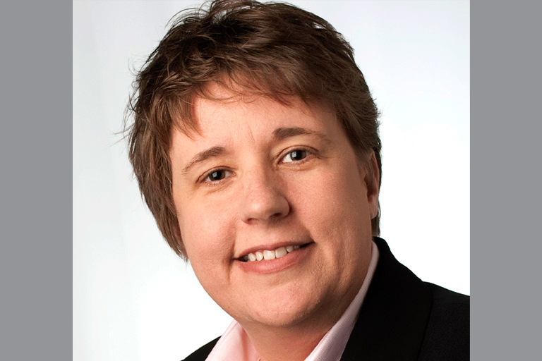 Headshot of Angie Raymond